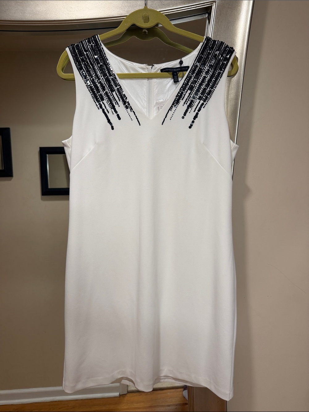 White Sleeveless V-Neck Mini Dress with Black Sequin Shoulder Detail